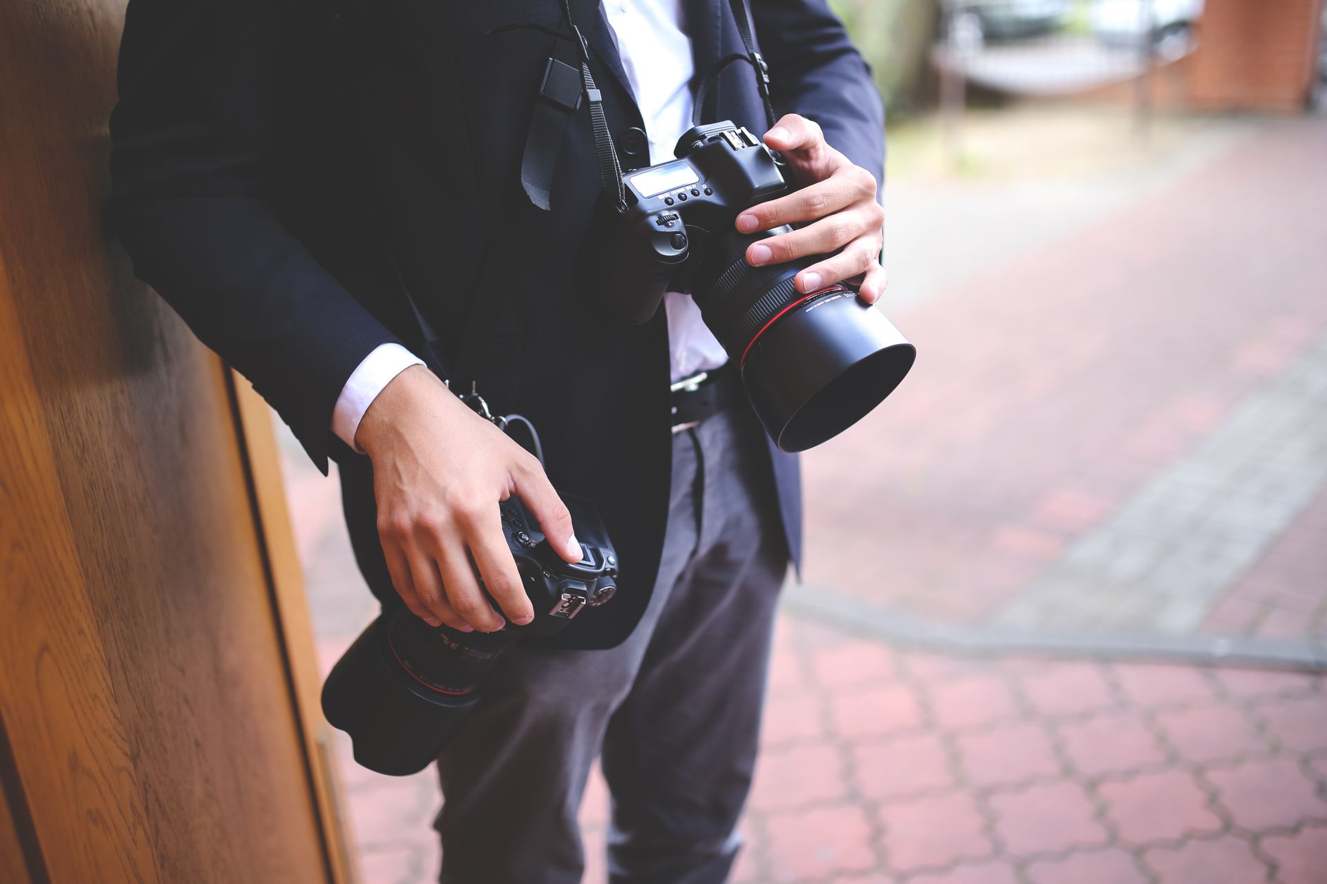 Mara adjusting a camera on location