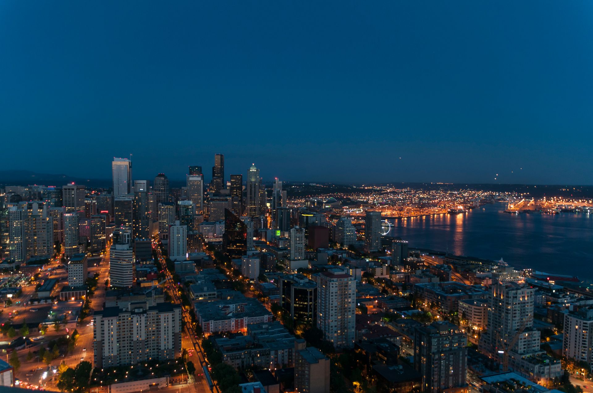 Aerial view of a city skyline at dusk